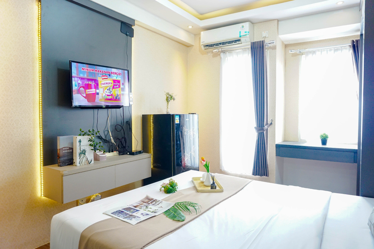 Bedroom 2, Nice and Warm Studio at Podomoro Golf View Apartment By Travelio, Bogor