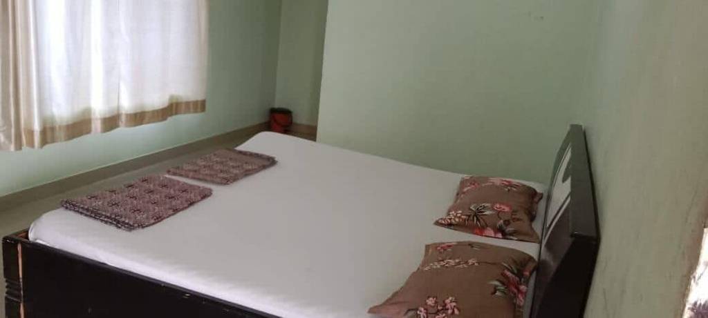 Room 5, Nisarg Guest House, Raigarh