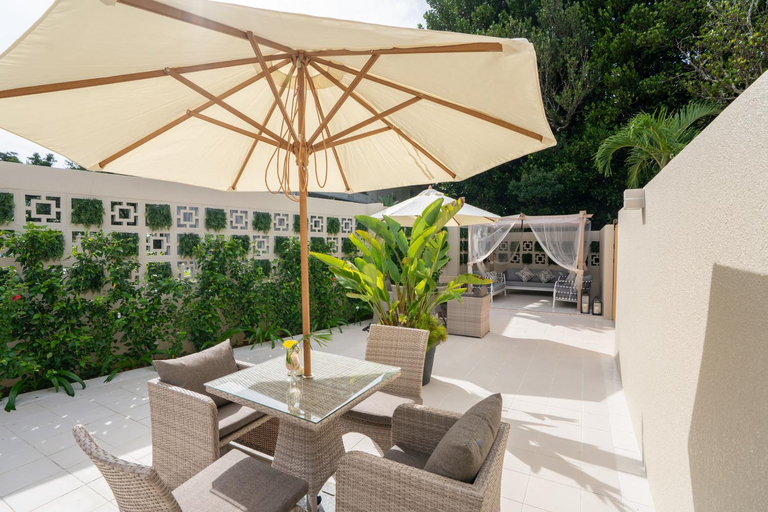Shared lounge/TV area 2, THE GARDEN Bise, Motobu