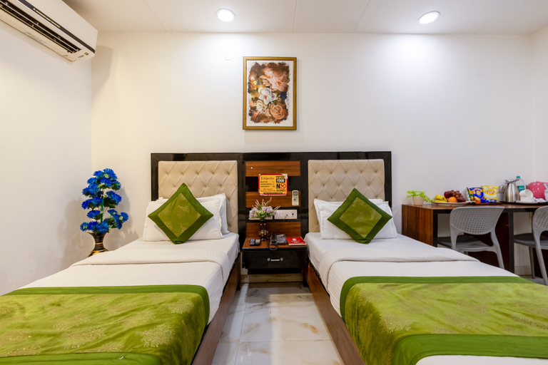 Room 4, Hotel Divines Residency, Gautam Buddha Nagar