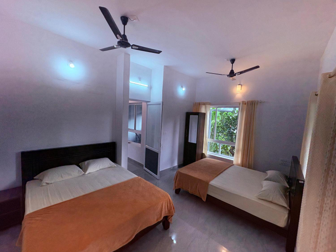Bedroom 2, Eve's Residency, Wayanad