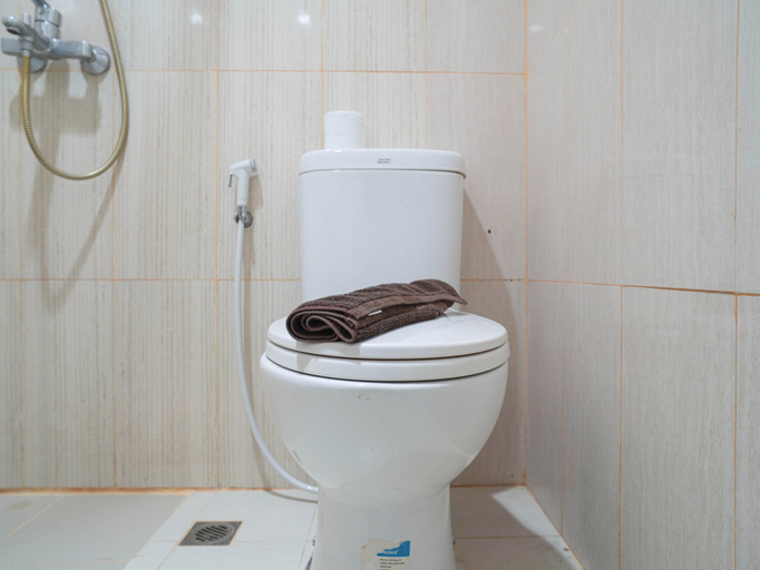 Bathroom 2, Relaxed Living 1BR at Sentul Tower Apartment By Travelio, Bogor