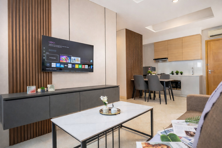 Living Room 2, Chic and Homey 2BR at Capitol Suites Apartment By Travelio, Jakarta Pusat