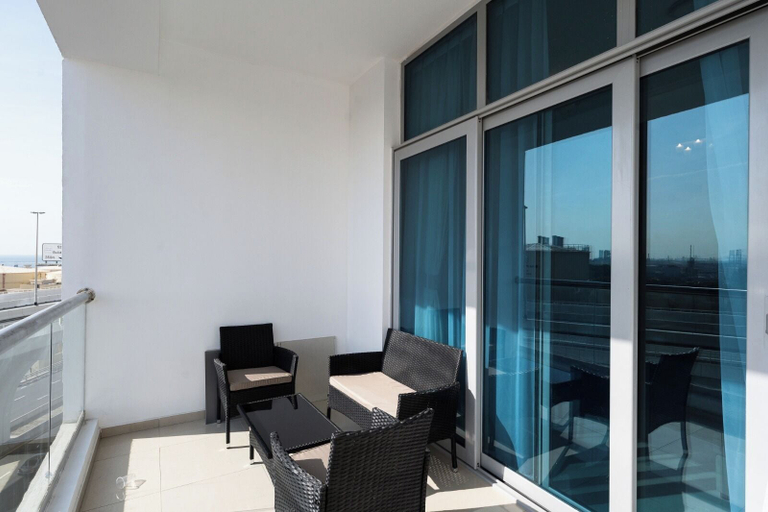 Balcony 3, Manzil - Spacious 2BR near Marina Beach, Dubai