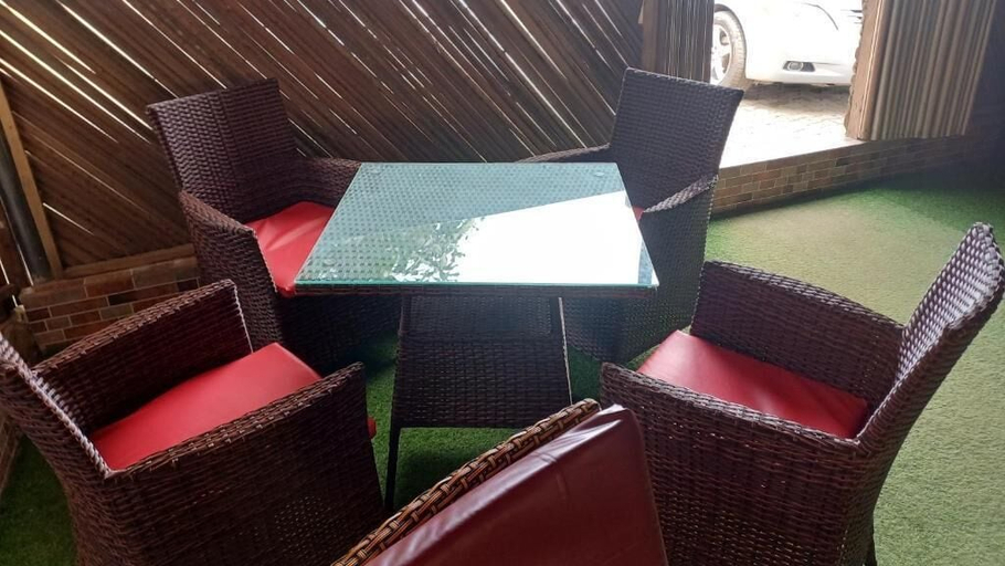 Outdoor dining, AP Luxury Inn, Alimosho