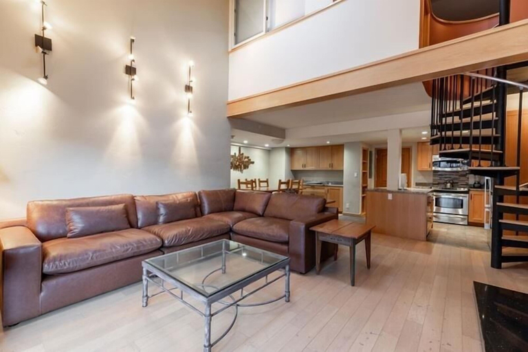 Living area, Condo with Hot Tub Free Garage Parking by RedAwning, Eagle