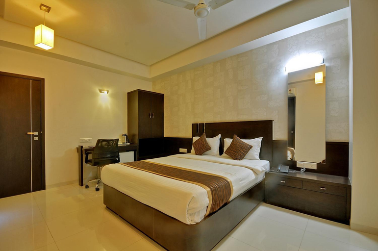 Bedroom 1, Hotel Magnum Inn, Junagadh