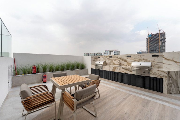 Outdoor dining 5, Chic Studio Cinema & Game Room in Arjan, Dubai