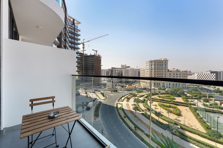 Outdoor dining 2, Chic Studio Cinema & Game Room in Arjan, Dubai
