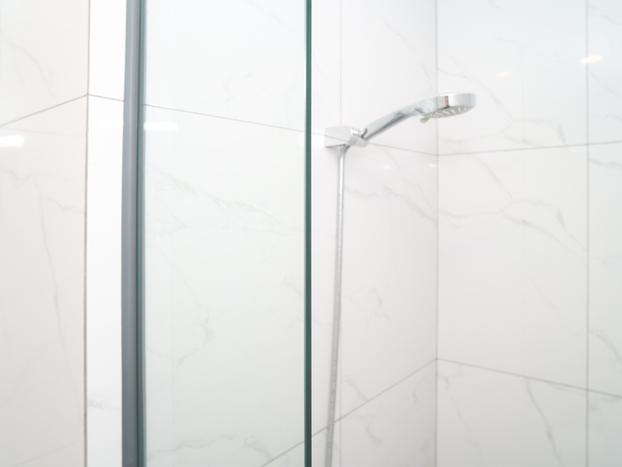 Bathroom 5, Chic and Comfortable Studio at Apartment Ciputra World 2 By Travelio, Jakarta Selatan