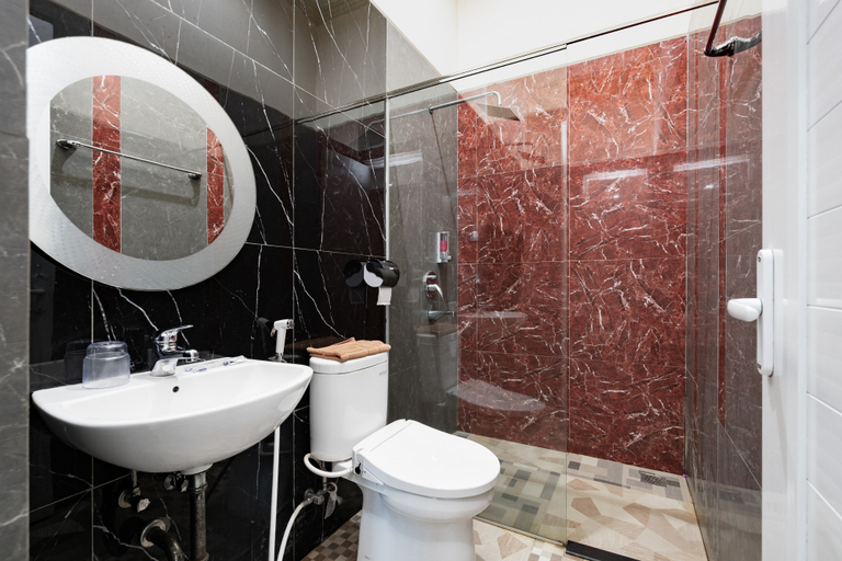 Urbanview Anelia Guest House Syariah Samarinda - Tap to explore photos