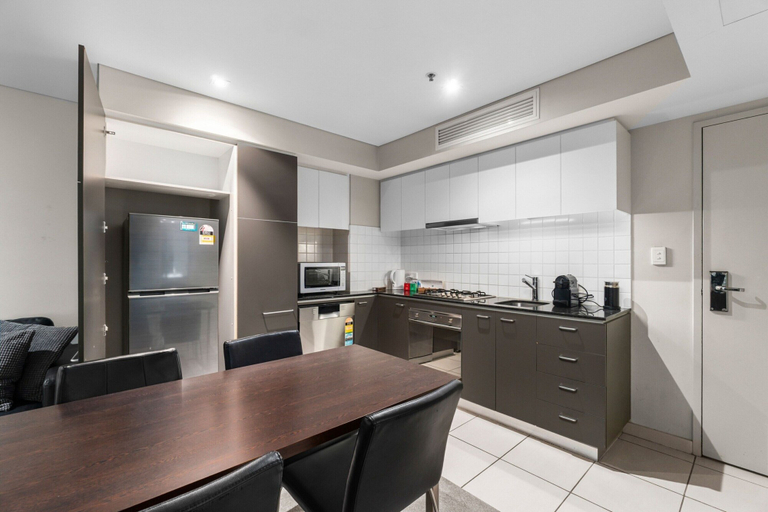 Private kitchen 5, 2-bed City Retreat With Gym and Pool Access, Adelaide