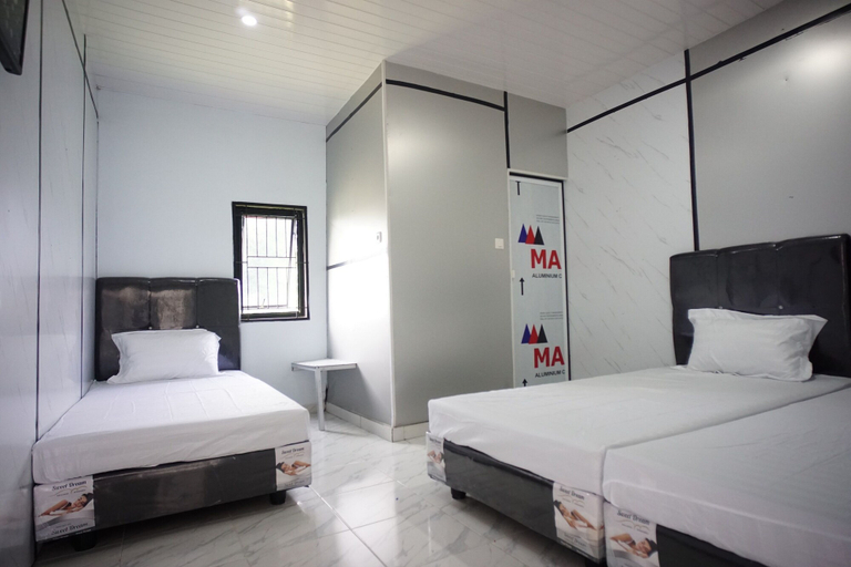 Room 4, OYO 94903 Akasia Guesthouse, Serdang Bedagai