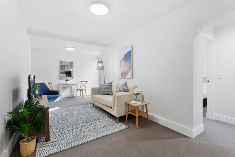 Living area 3, Chic 1-Bed Apartment Steps From Shopping Street, Melbourne