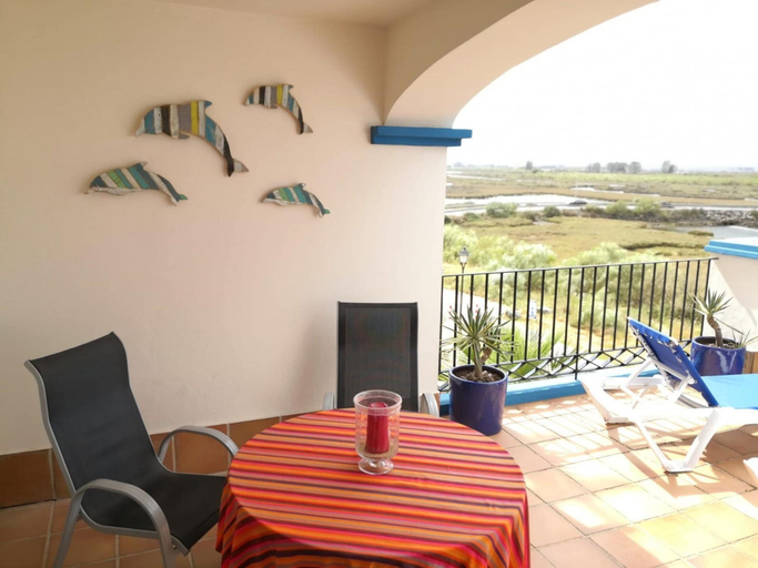 Outdoor dining 2, Seaside Apartment in Punta del Moral, Huelva