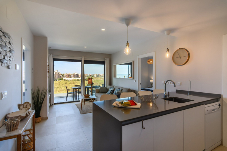 Private kitchen 3, Beachfront Isla Canela Apartment, Huelva