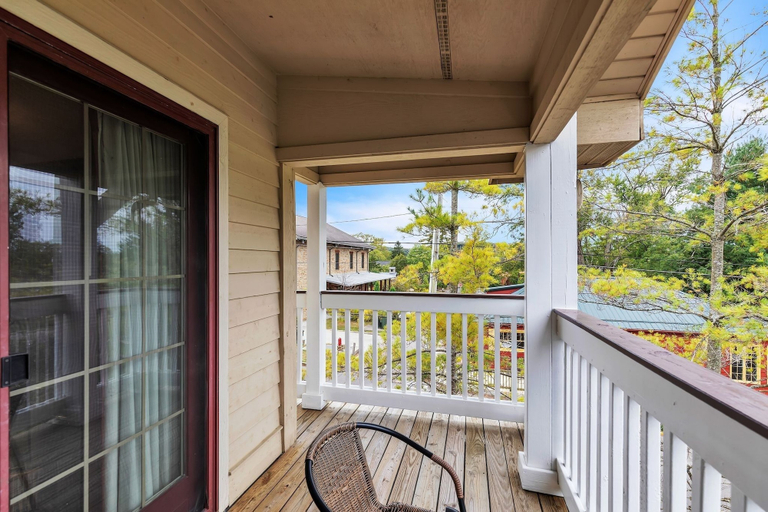 Property grounds 2, 3rd Floor Front Side Corner Penthouse Suite - 301 by Grand Wood Suites, Brown