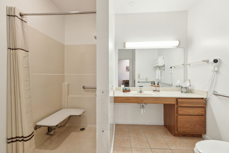 Bathroom 5, 1st Floor Front Side Suite - 104 by Grand Wood Suites, Brown