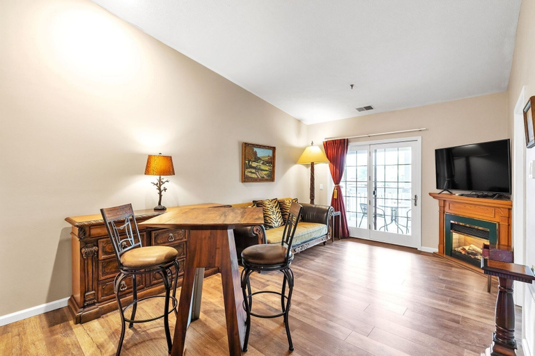 Living area 4, 3rd Floor Front Side Penthouse Suite - 302 by Grand Wood Suites, Brown
