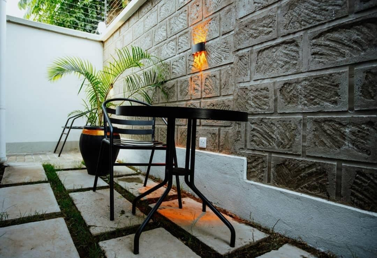 Outdoor dining 2, Origin Ventures Hostel, Moshi Urban
