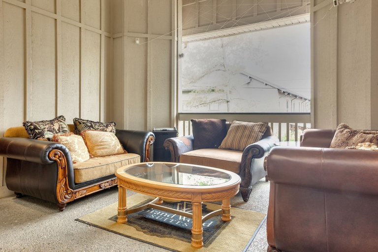 Living area 3, 1st Floor Front Side Suite - 104 by Grand Wood Suites, Brown