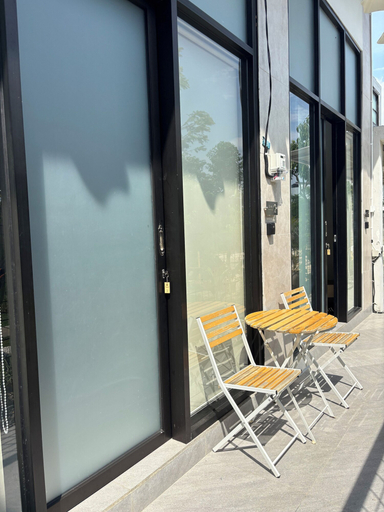 Outdoor dining, Olive Athena Guesthouse, Denpasar