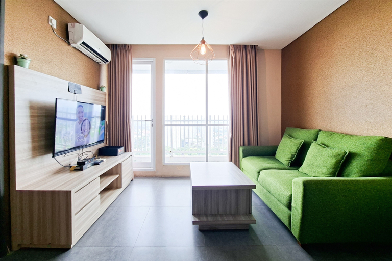 Living Room 4, Cozy and Pleasant 2BR at Apartment Bintaro Icon By Travelio, Tangerang Selatan