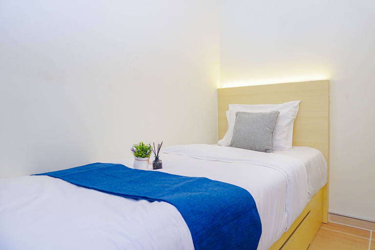 Bedroom 3, 2BR near Paramadina University at Meikarta District 2 Apartment By Travelio, Cikarang