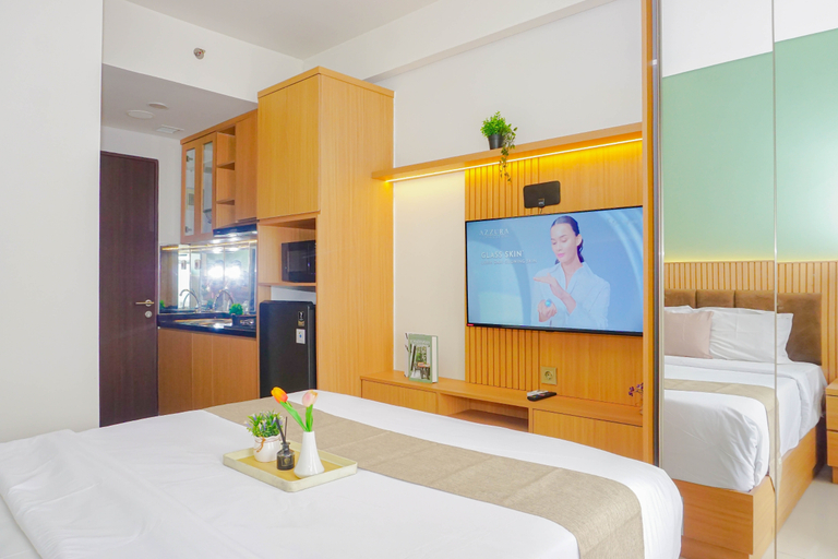 Bedroom 4, Soft Toned Studio at Transpark Cibubur Apartment By Travelio, Depok