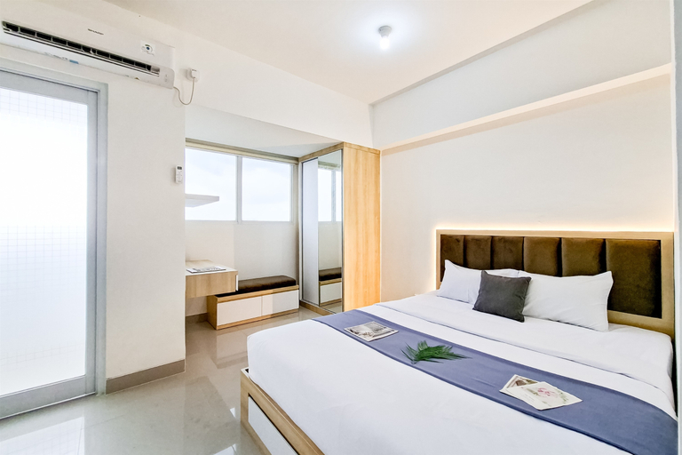 Bedroom 2, Comfy Studio with City View at Cisauk Point Apartment By Travelio, Tangerang