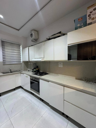 Private kitchen, Oputa Jay Apartment, AbujaMun