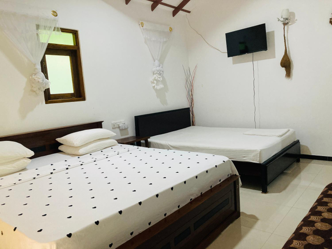 Bedroom 2, suncity privacy cottages, Embilipitiya