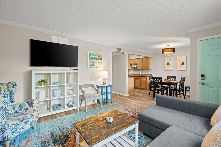 Living area 5, Colorful Condo W/shared Pool, Free Wifi, Central A/C - Blocks From the Beach, Saint Johns