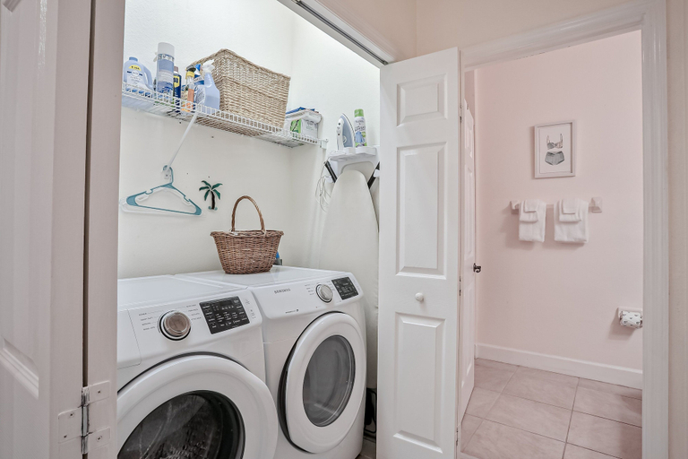 Laundry, Elegant Waterfront Condo With Central AC, Balcony, and Shared Pools & hot Tubs, Flagler
