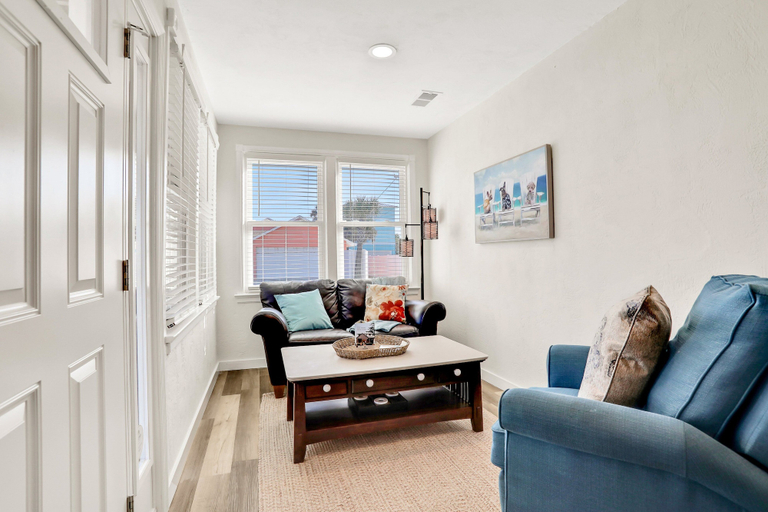Living area 2, Updated Home Across From Beach With Covered Balcony, Central AC, & Washer/dryer, Flagler