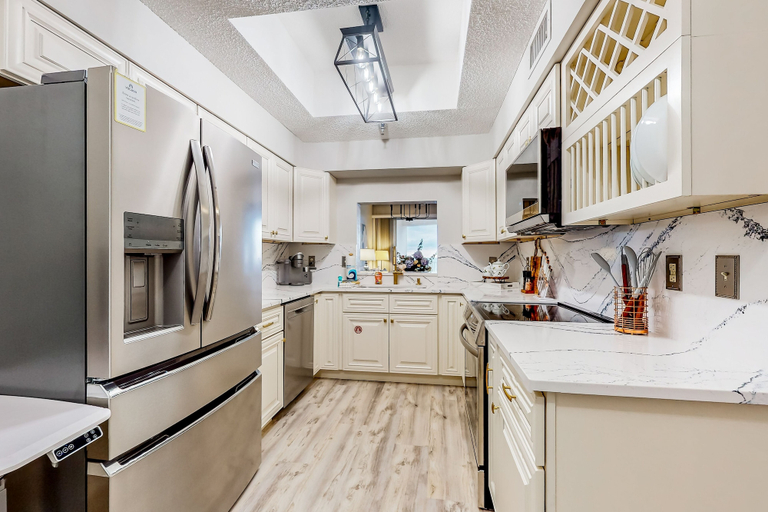 Private kitchen 2, Seaside Serenity: Beachfront Haven in Palm Coast With Resort Amenities, Flagler