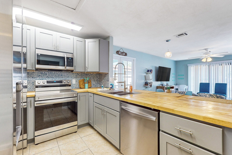 Private kitchen, Centrally Located Dog-friendly Home With Beach Gear & Patio - Snowbird-friendly, Flagler