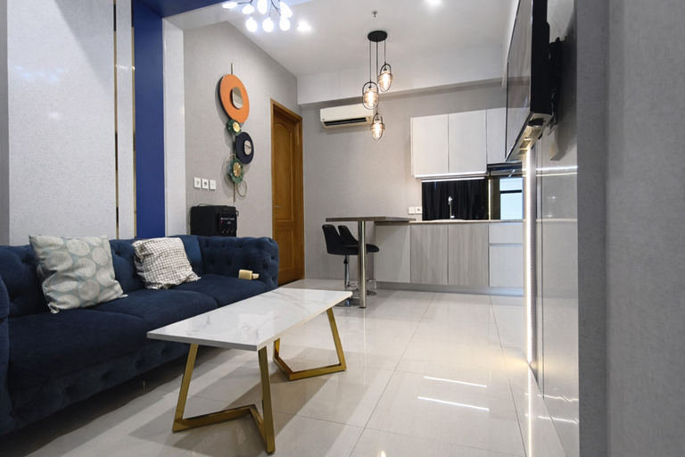 Living Room 4, Modern Look 2BR Apartment at The Wahid Private Residence By Travelio, Medan