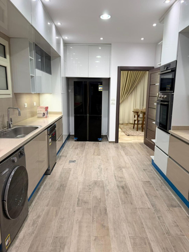 Private kitchen 2, Alsawah | 4 En-suite Villa with Private Pool, Sheikh Zayed