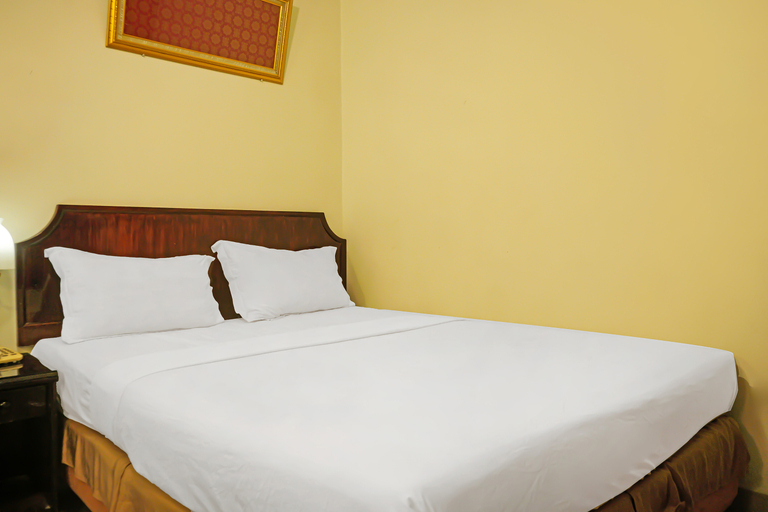 Collection O 92690 Hotel Limas - Tap to explore photos