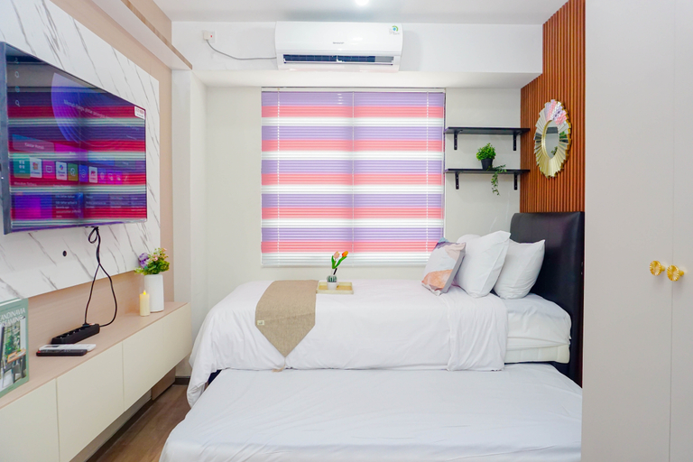 Bedroom 3, Compact Look Studio at Meikarta Apartment By Travelio, Cikarang