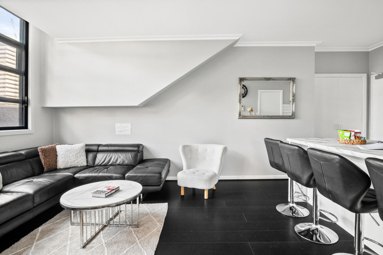 Separate living room 4, Central 3-Bed Apartment in Vibrant Melbourne, Melbourne