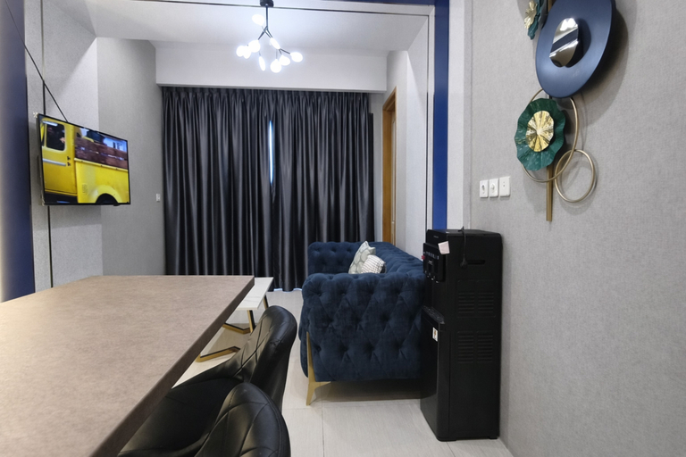 Living Room 2, Modern Look 2BR Apartment at The Wahid Private Residence By Travelio, Medan