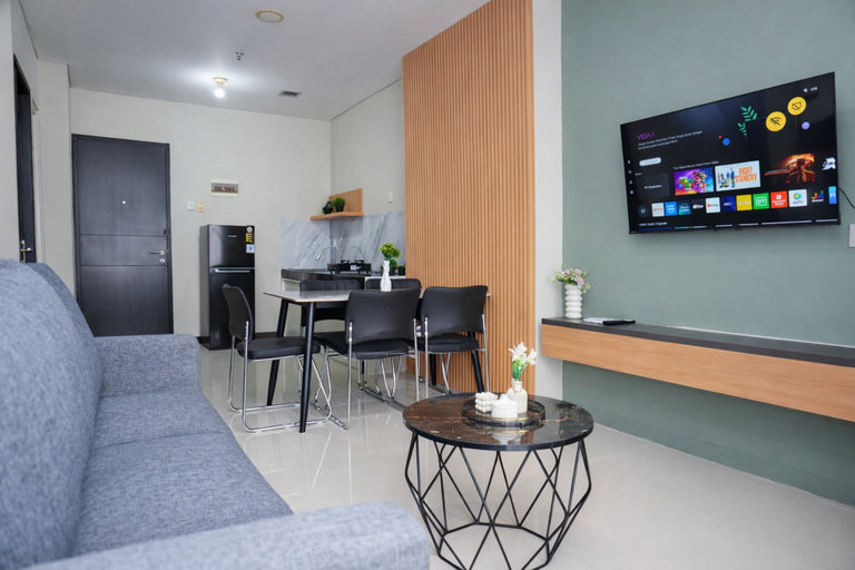 Living Room 3, Cozy and Nicely Designed 2BR at Nifarro Park Apartment By Travelio, Jakarta Selatan