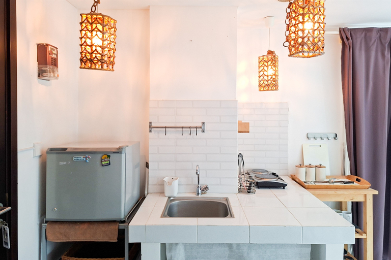 Others 2, Warm Rustic Studio at Casa de Parco Apartment By Travelio, Tangerang