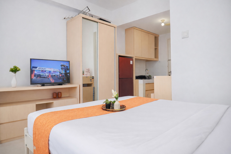 Bedroom 3, Simple Style Studio at Prima Orchard Apartment By Travelio, Bekasi
