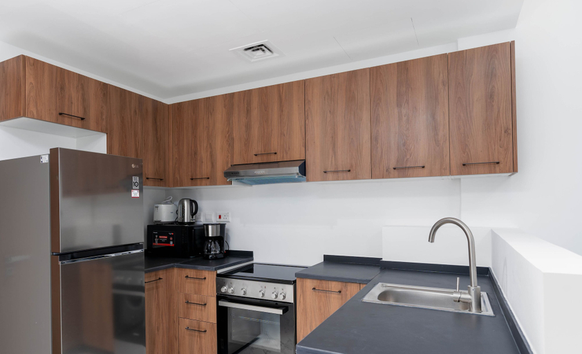 Private kitchen, Bloomfields Executive 1BR Oasis Masdar, Abu Dhabi City