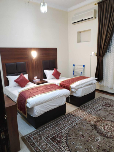 Bedroom 4, Al Eairy Serviced Apartments Company 1