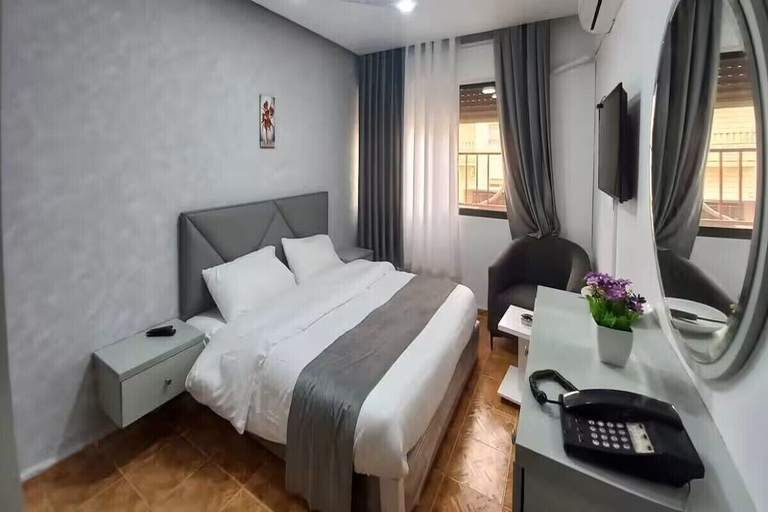 Bedroom 3, Al-Nujoom Hotel Suites, Amman