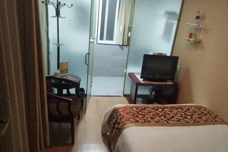 Bedroom 1, Chunjiang Hotel, Yichang
